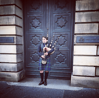 Playing the bagpipes